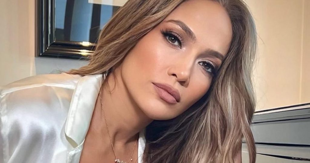 J Lo Styles a Plunging Lace Bra With a Necklace