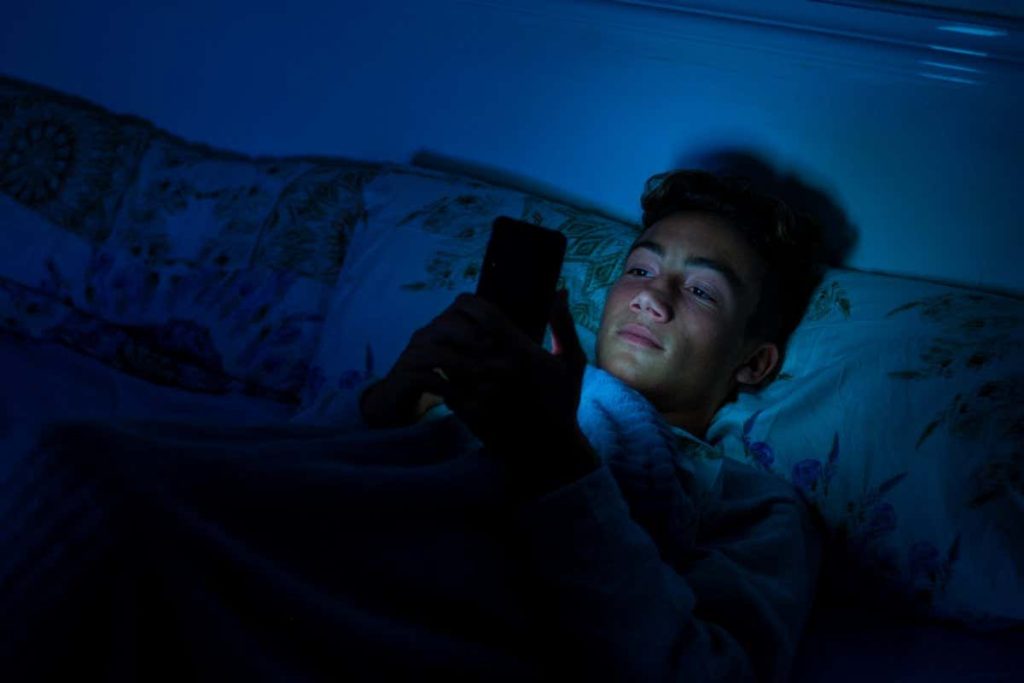 Boarding school rules on phones and bedtimes help teens get