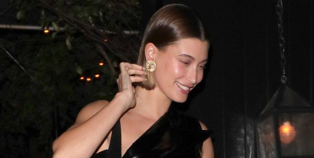 Hailey Bieber Wore a Little Black Patent Leather Dress Out