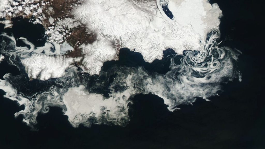 Ethereal ice swirls dance around Arctic peninsula in stunning new