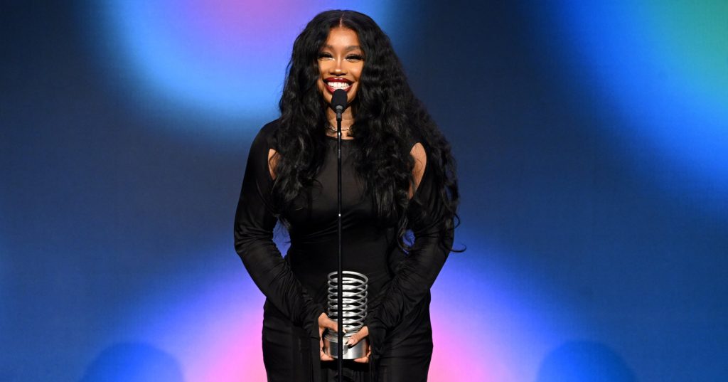 SZA Shows Off Her Butt Tattoo With Low-Rise Cargos and